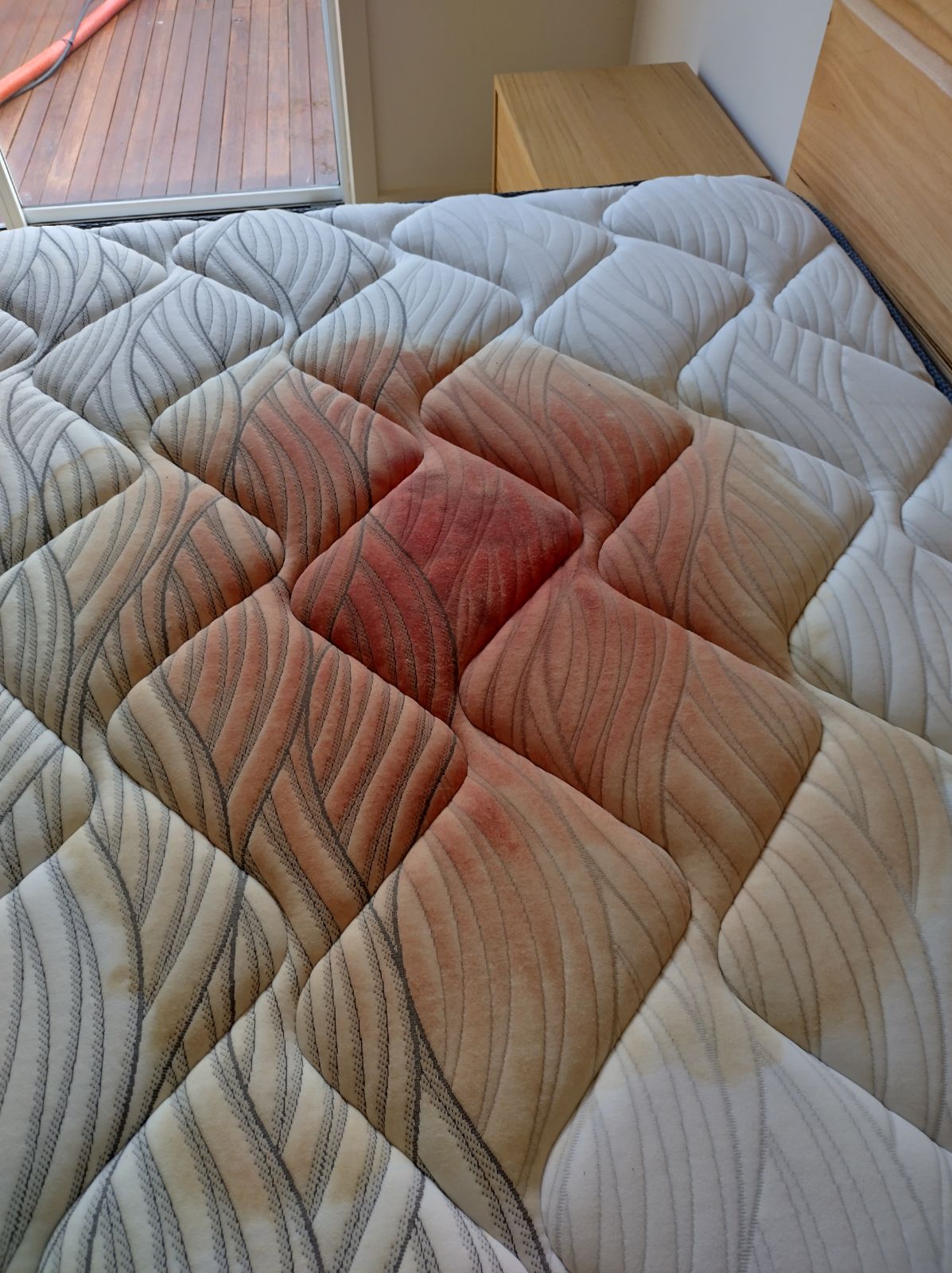 Mattress before, stained